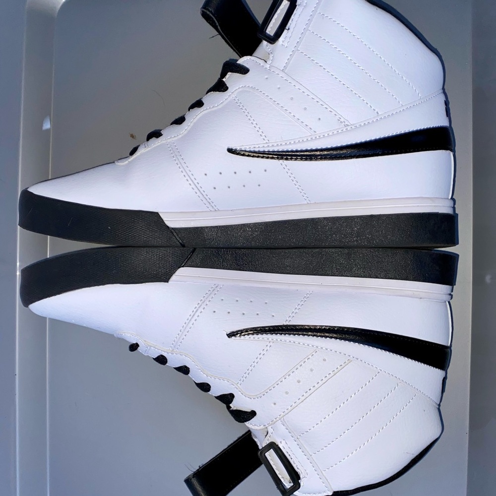 SZ 9 1/2 FILA white and black high top sneakers